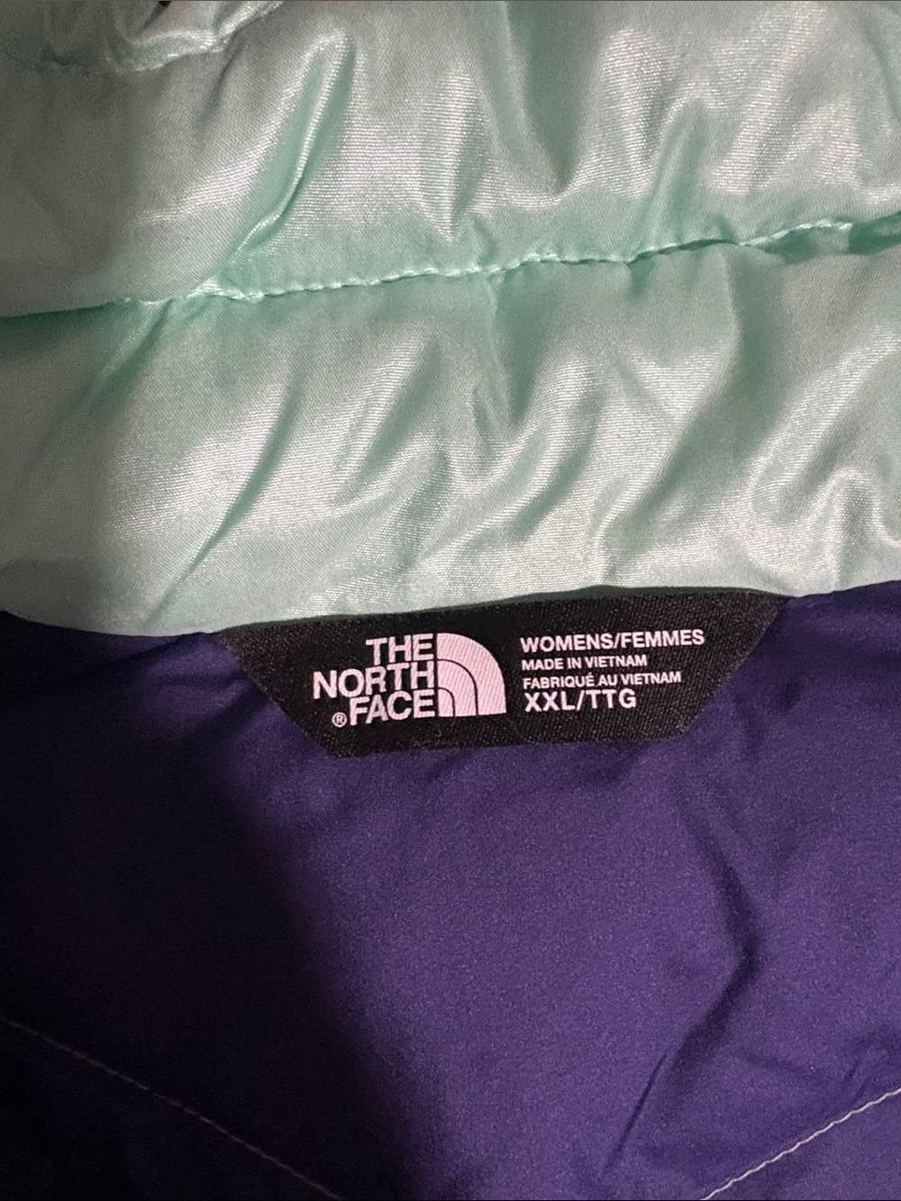 The North Face Women’s Two-Tone Puffer Jacket in Teal & Purple